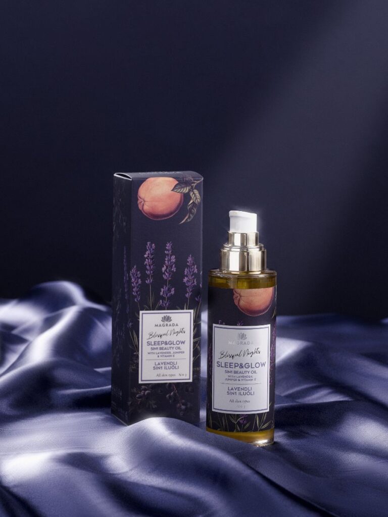Magrada Organic Cosmetics Sleep & Glow lavender body oil bottle with packaging on dark satin fabric luxury body gift set