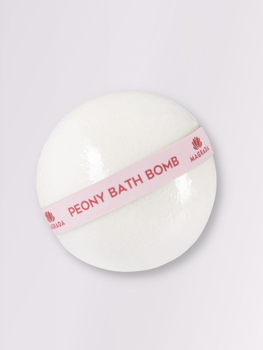 White peony bath bomb with Magrada Organic Cosmetics pink label from peony bath bomb gift set